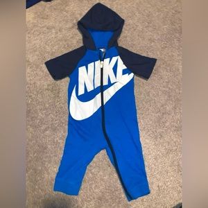 Like new Nike 9-12 month short sleeve arm with long sleeve leg hooded romper